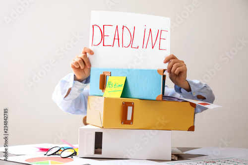 Businessperson holding "dea...
