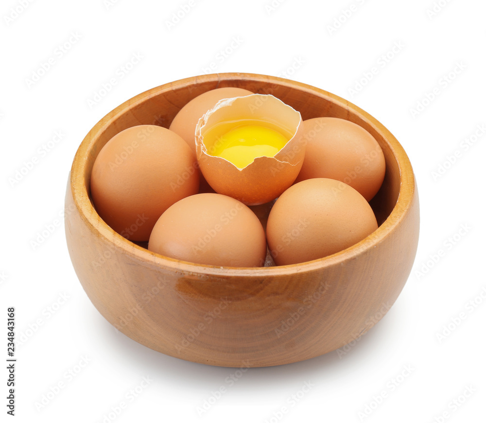 Raw chicken eggs in bowl on white background Raw chicken eggs in bowl on white background