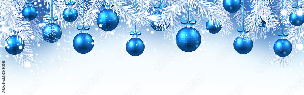 Christmas and New Year banner with fir branches and blue Christmas balls.