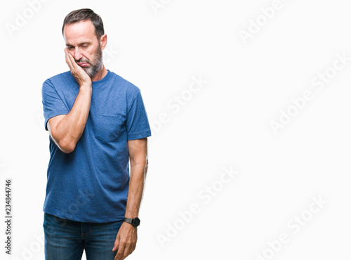 Middle age hoary senior man over isolated background thinking looking tired and bored with depression problems with crossed arms.