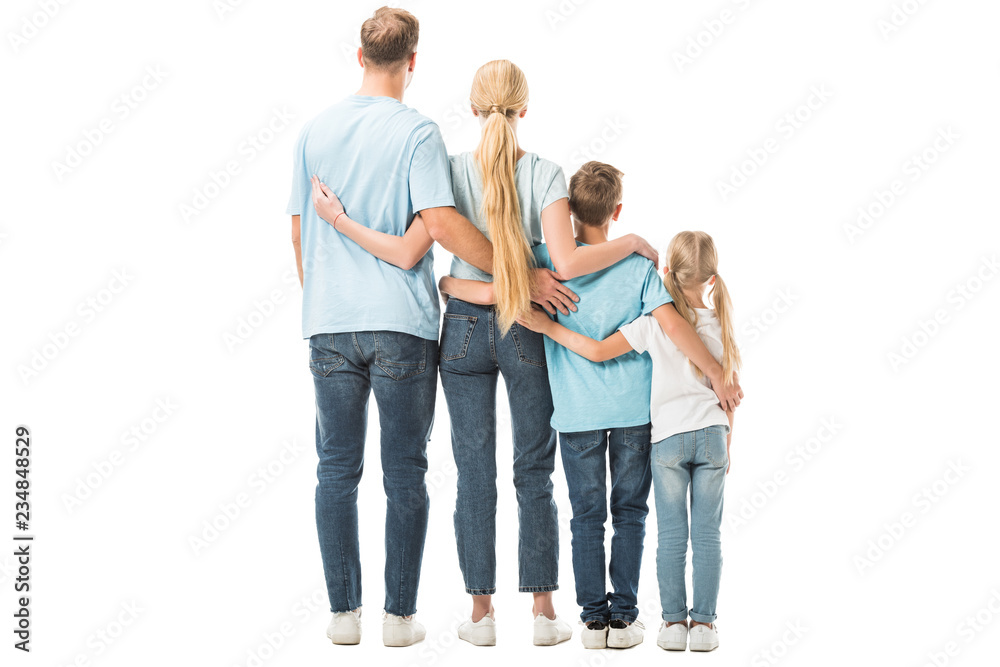 Back view of family standing and hugging isolated on white