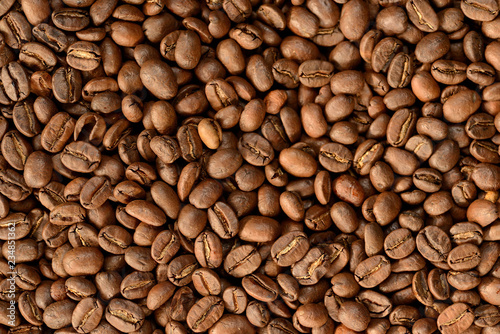 Roasted brown coffee beans pattern, background, top view