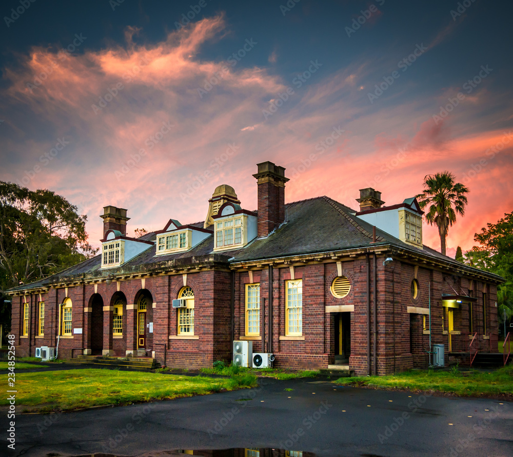Old Victorian Edwardian Era Colonial Building. Sunset sky. Stock Photo ...