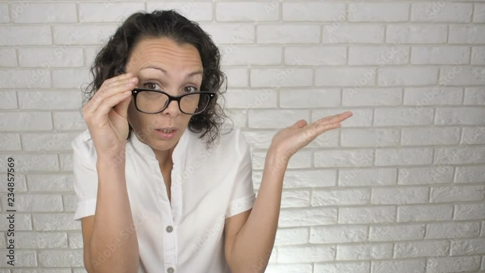 Confused woman. Confused woman with glasses for vision. Confused woman. Confused woman with glasses for vision.