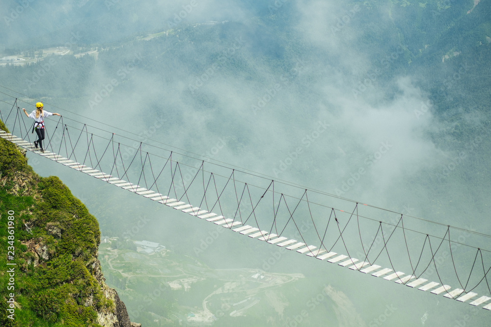 Obraz premium Rope bridge in the mountain
