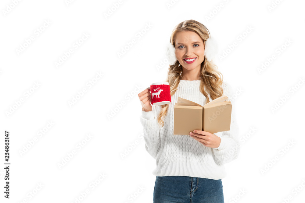 beautiful girl in winter outfit holding book and coffee cup isolated on white beautiful girl in winter outfit holding book and coffee cup isolated on white