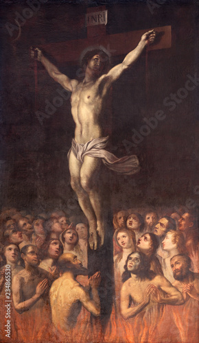 PRAGUE, CZECH REPUBLIC - OCTOBER 13, 2018: The painting of Crucifixion among the souls in Purgatory in the church kostel Svatého Ignáce by Jan Jiří Heinsch (1647 - 1712).