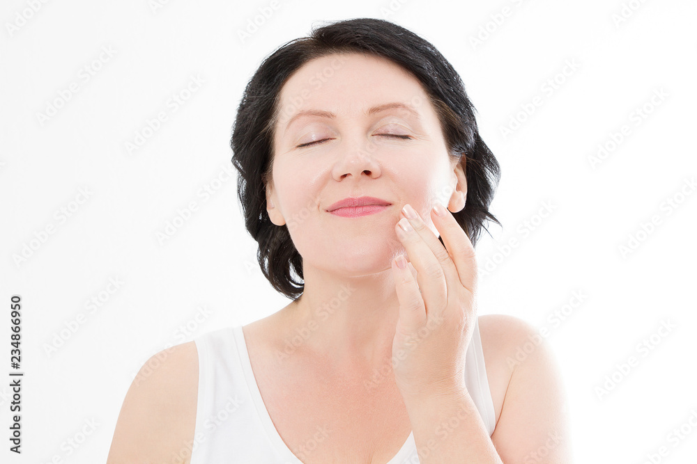 Beauty middle age woman face portrait. Spa and anti aging concept Isolated on white background. Plastic surgery and collagen face injections. Wrinkles and menopause. Mock up. Copy space Beauty middle age woman face portrait. Spa and anti aging concept Isolated on white background. Plastic surgery and collagen face injections. Wrinkles and menopause. Mock up. Copy space
