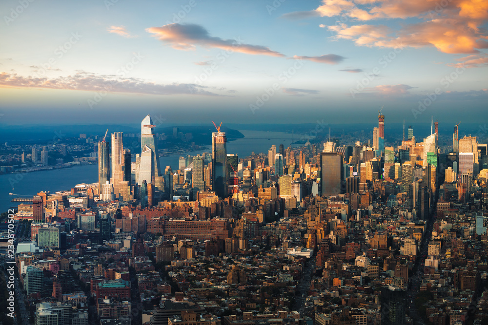 New York city skyline with urban skyscrapers at sunset, NYC USA