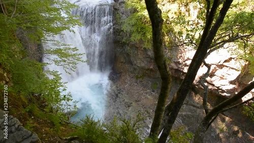 Wonderful waterfall in the middle of the forest in Ordesa National Park, Spain. Lanscape with waterfall.