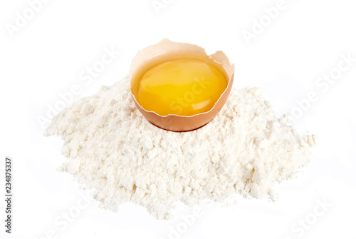 A pile of flour and broken egg cut out.