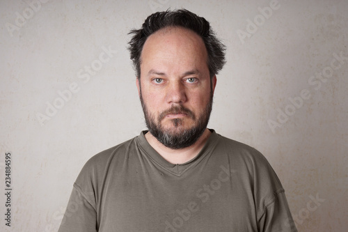 Canvas Print grubby scruffy man in his forties