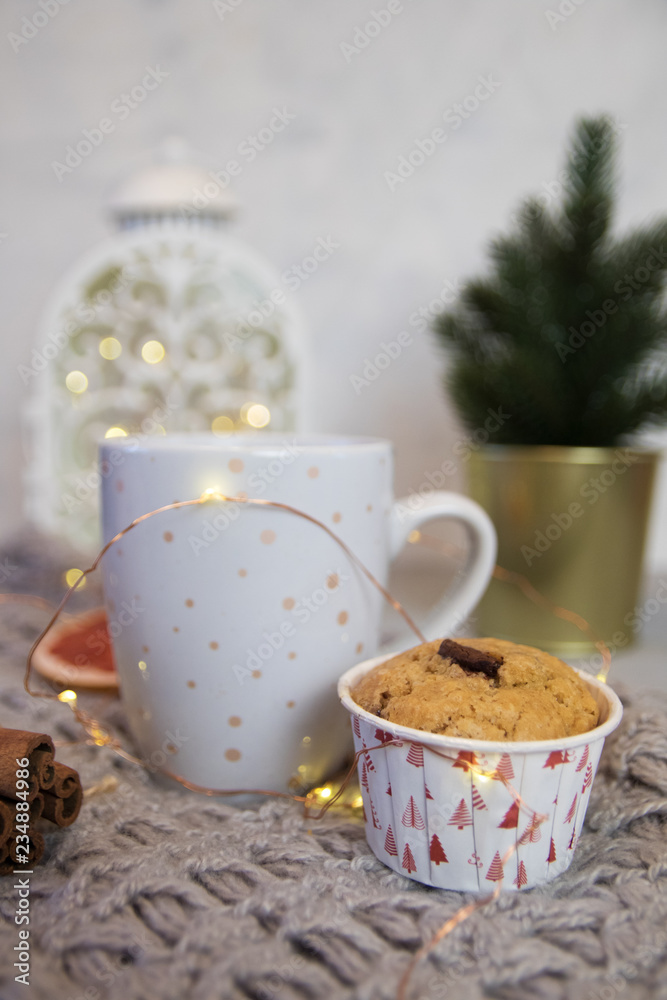 custom made wallpaper toronto digitalWinter still life from scarf, white mug of cocoa, coffee or hot chocolate, muffin, christmas tree on warm plaid with garland.
