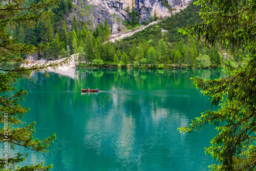 Fototapeta Naklejka Na Ścianę i Meble -  Lake Braies (also known as Pragser Wildsee or Lago di Braies) in Dolomites Mountains, Sudtirol, Italy - Europe. Romantic place with typical wooden boats on the alpine lake.