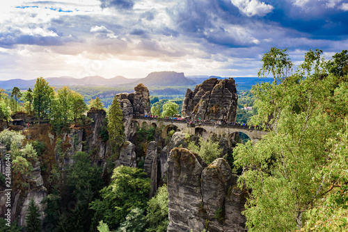 Panorama view on the Bastei bridge. Bastei is famous for the beautiful rock formation in Saxon Switzerland National Park  near Dresden and Rathen - Germany. Popular travel destination in Saxony.