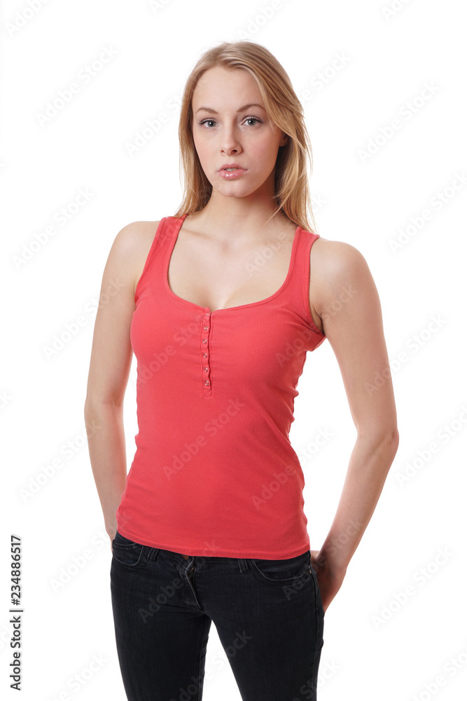 cool young woman wearing jeans and red tanktop                              