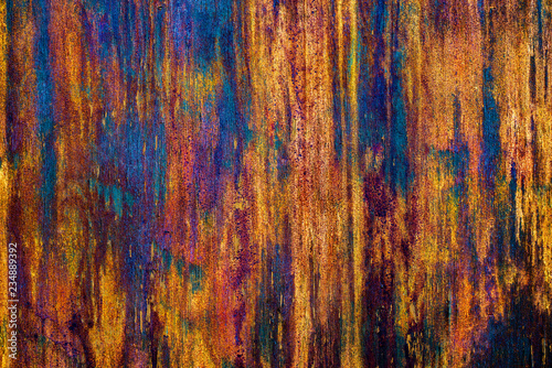 Peeling colorful paint on wood grunge background texture pattern.