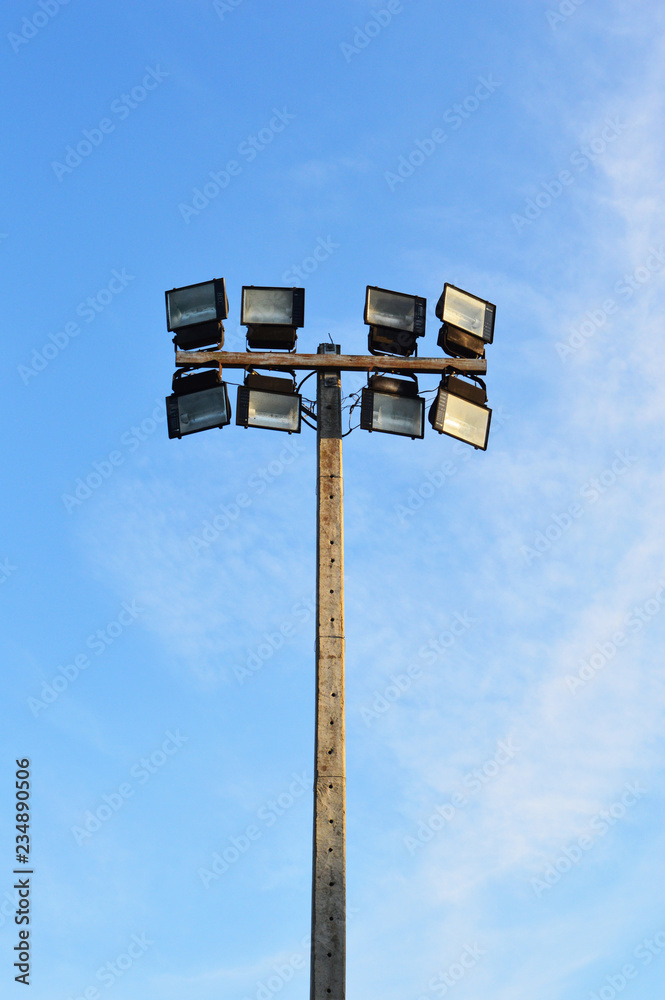 electric pole stadium light and blue sky - stadium spot light tower electric pole stadium light and blue sky - stadium spot light tower