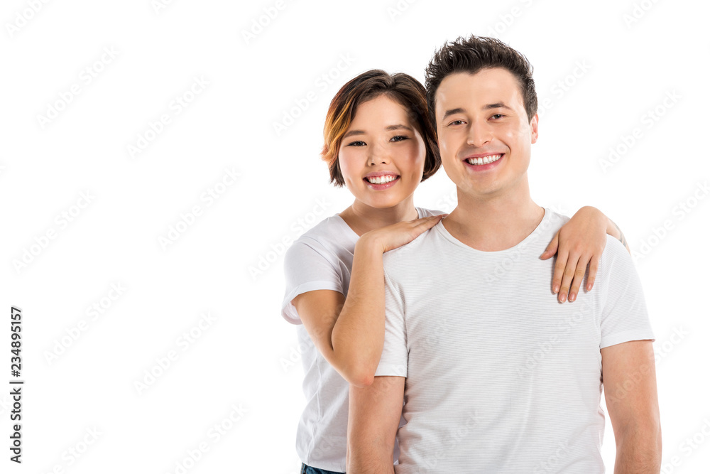 portrait of loving couple hugging and looking at camera isolated on white portrait of loving couple hugging and looking at camera isolated on white