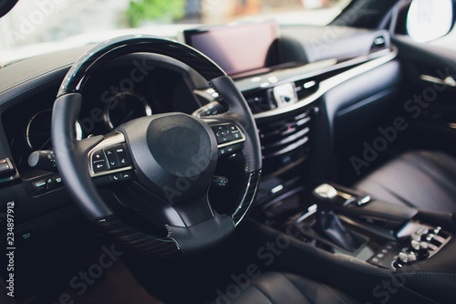 Leather upholstery inside the car modern interior. © Евгений Вершинин