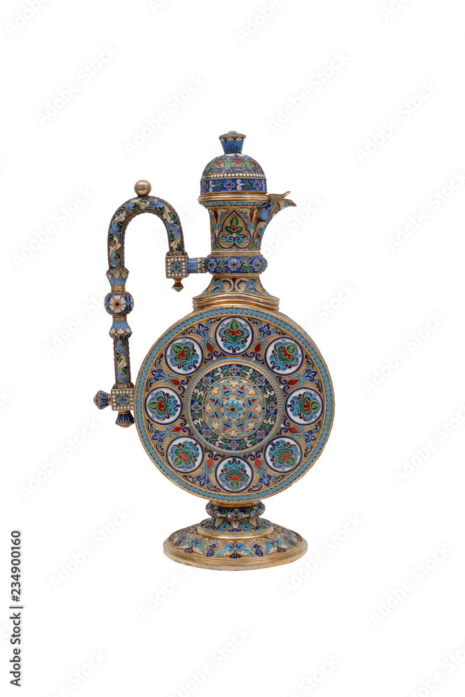 Oriental Silver jug for wine on a white background. Isolated. Oriental Silver jug for wine on a white background. Isolated.