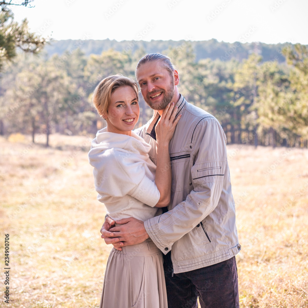 Fototapeta premium Couple in love hugging in the forest.
