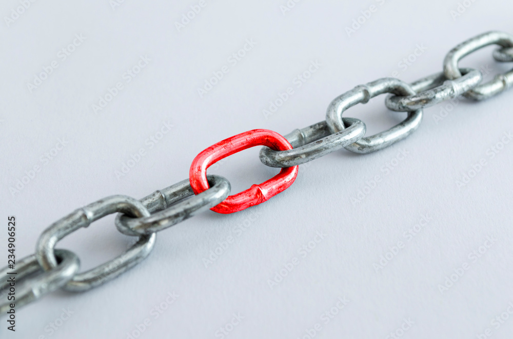 Diagonal metal chain, with red link Diagonal metal chain, with red link