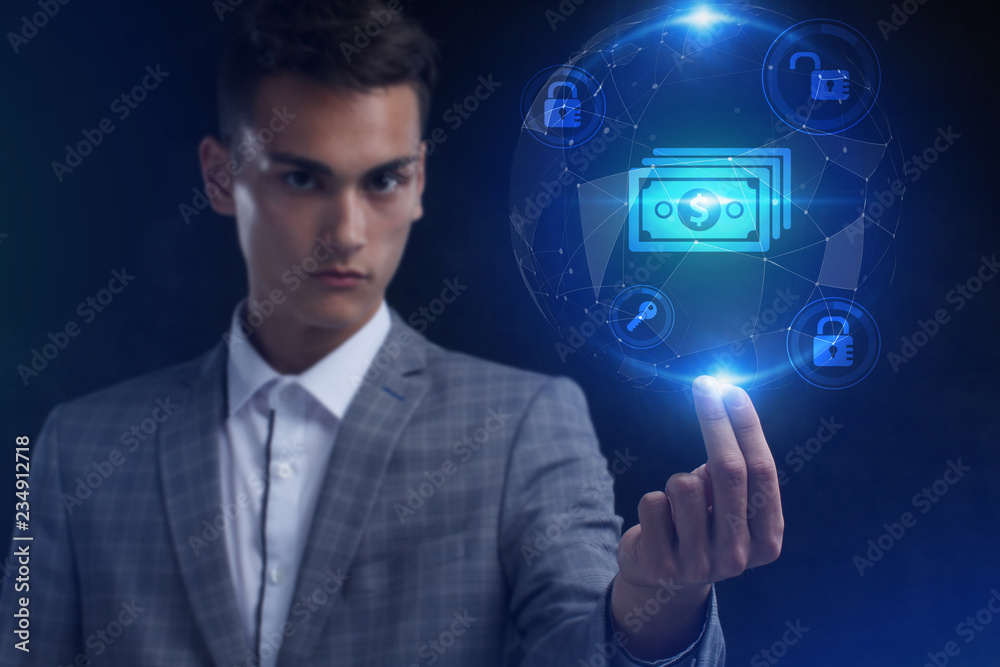 The concept of business, technology, the Internet and the network. A young entrepreneur working on a virtual screen of the future and sees the inscription: The concept of business, technology, the Internet and the network. A young entrepreneur working on a virtual screen of the future and sees the inscription: