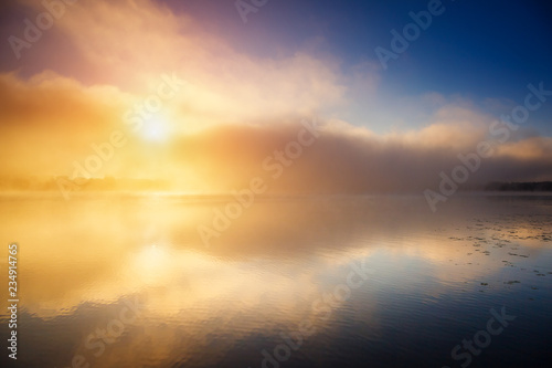 Vivid view of the foggy pond in twilight. Location place Ternopil, Ukraine, Europe.
