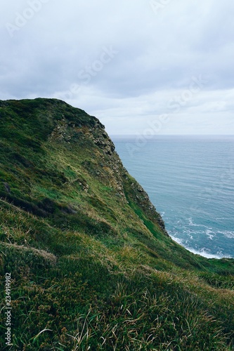 the cliff and ocean in the coast 