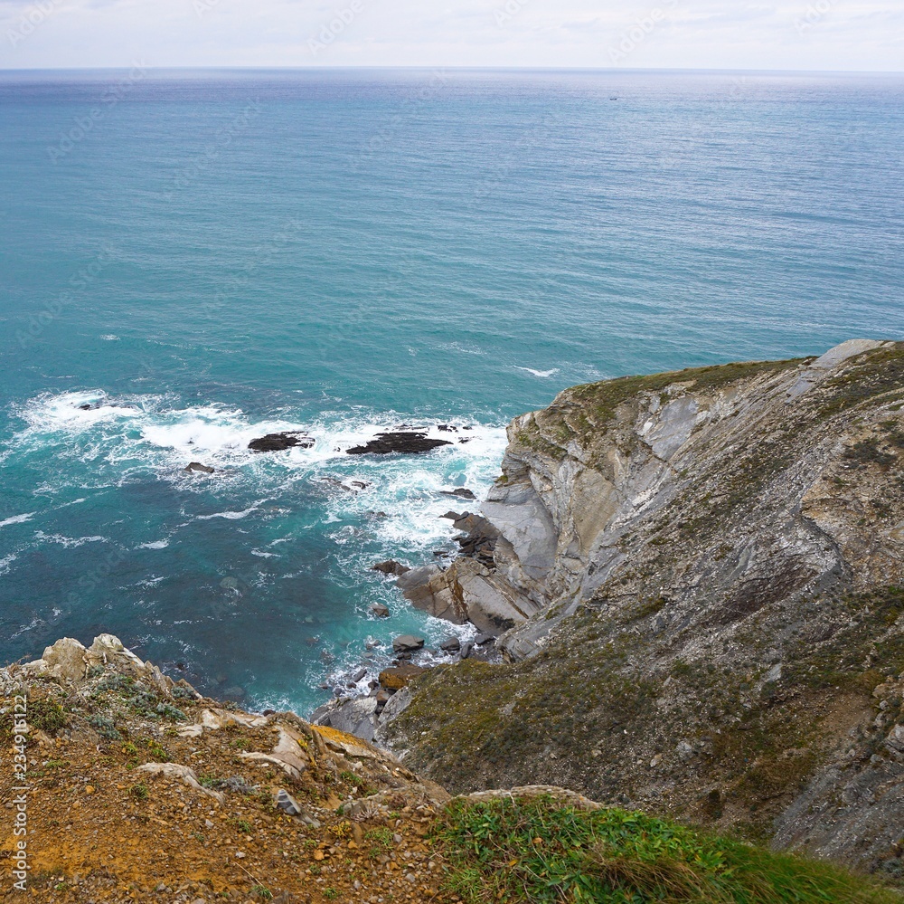 the cliff and ocean in the coast 