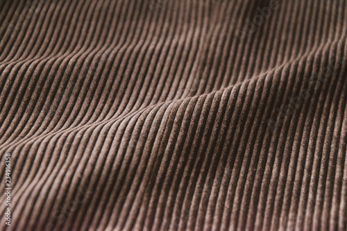 brown ribbed corduroy background. corduroy fabric texture