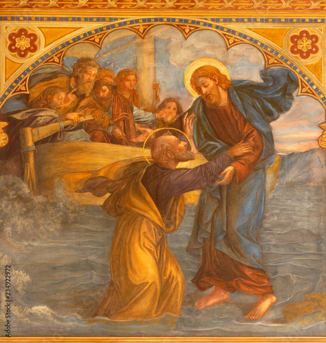 PRAGUE, CZECH REPUBLIC - OCTOBER 13, 2018:  The fresco  Peter, walking on water toward Jesus  in church kostel Svatého Václava by S. G. Rudl (1900).