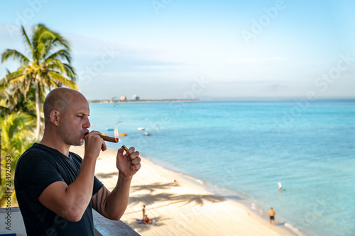 Smoking cigar in Cuba