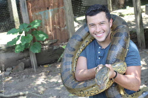 Man loving his gorgeous Anaconda