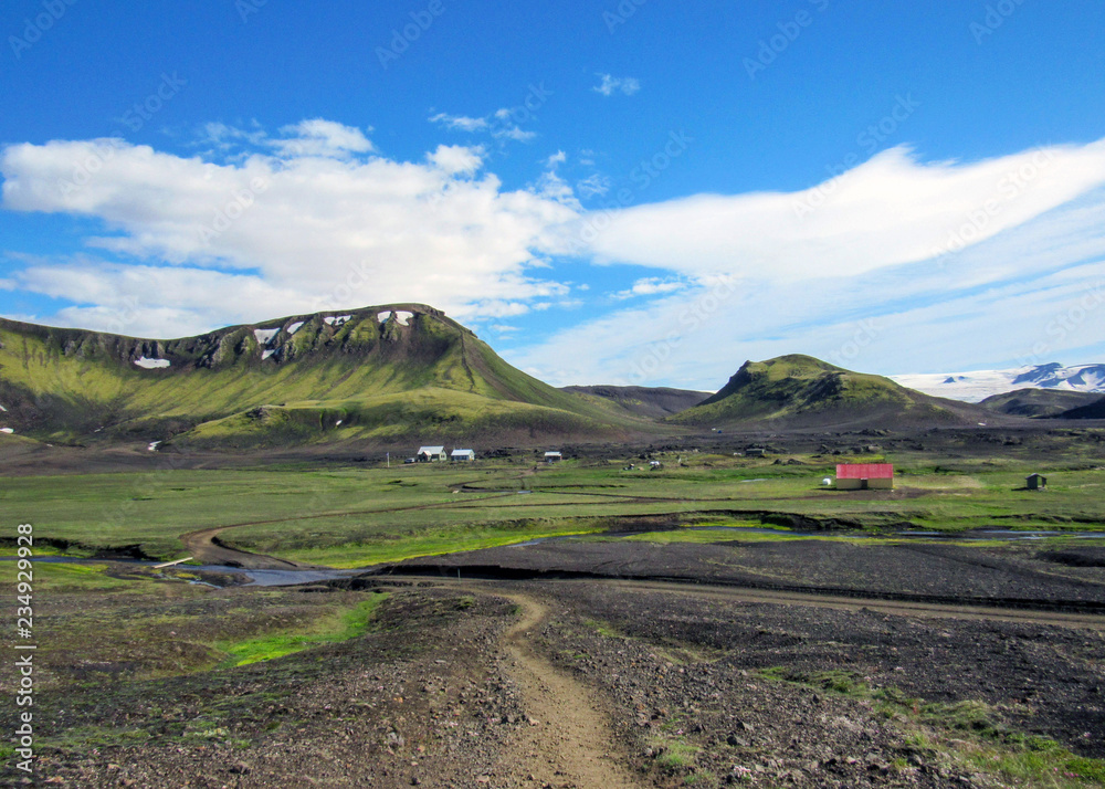 Hvanngil green valley in the highland and Myrdalsjokull glacier, part of the popular hiking trail Laugavegur, Iceland