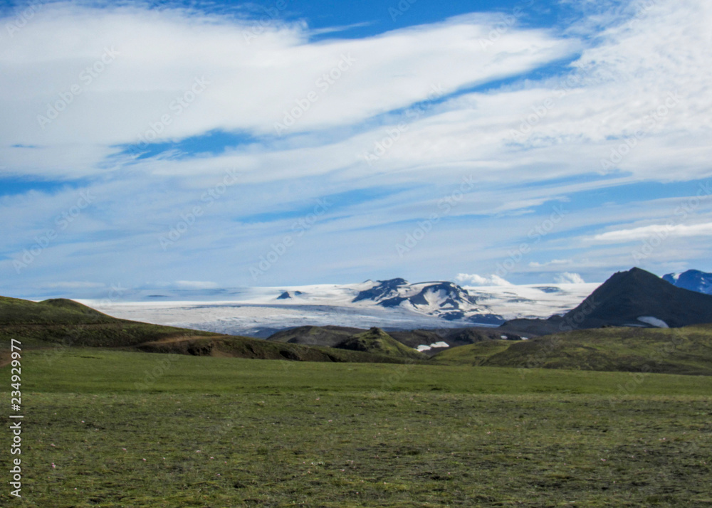Hvanngil green valley in the highland and Myrdalsjokull glacier, part of the popular hiking trail Laugavegur, Iceland