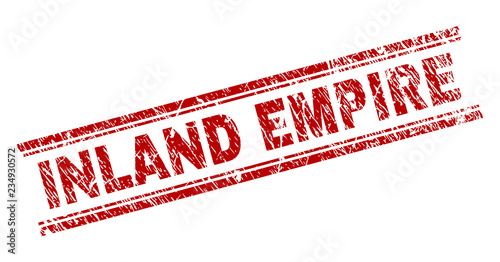 INLAND EMPIRE seal watermark with grunge texture. Red vector rubber print of INLAND EMPIRE text with grunge texture. Text caption is placed between double parallel lines.