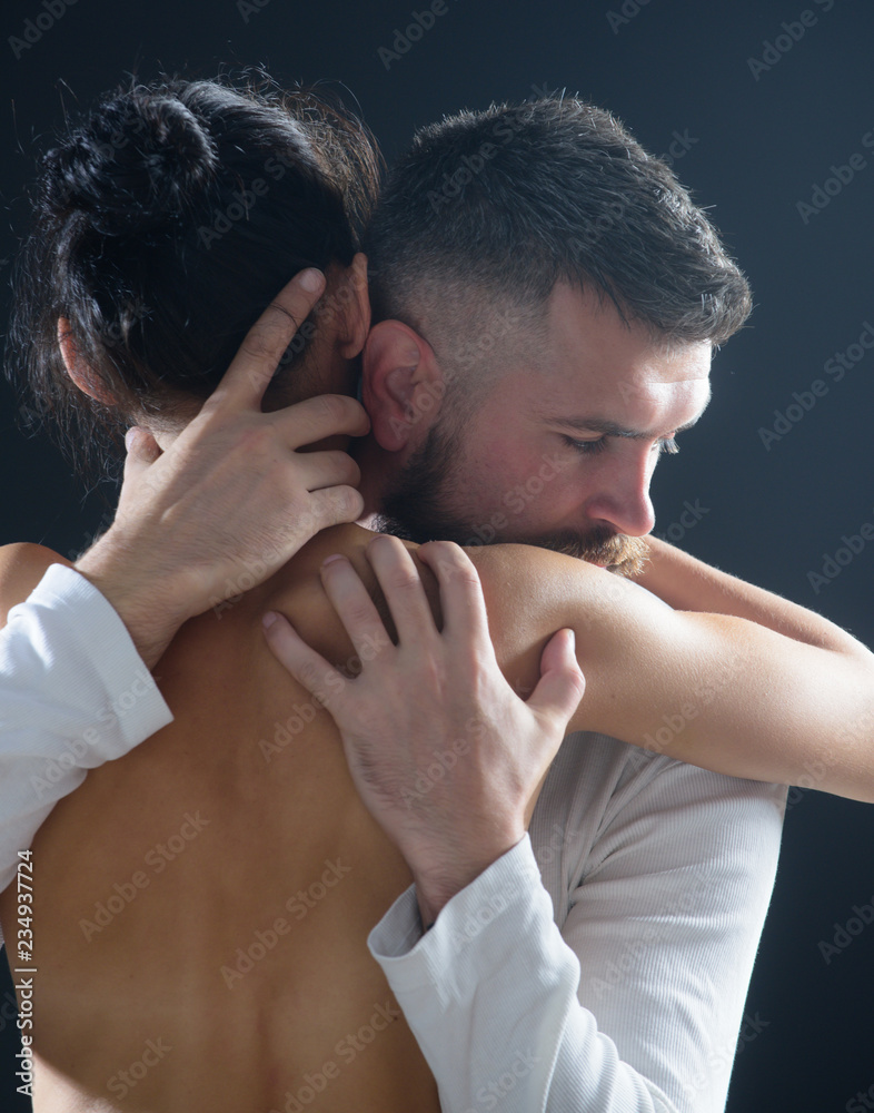 Fototapeta premium Embrace concept. Couple In Love embrace. Romantic and love. Intimate relationship and sexual relations. Closeup embrace. Passion and sensual touch.