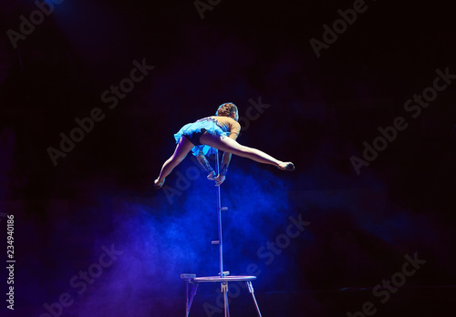 Performance of the acrobat girl in the circus.