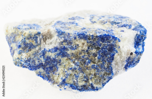 piece of lazurite (lapis lazuli) stone on white