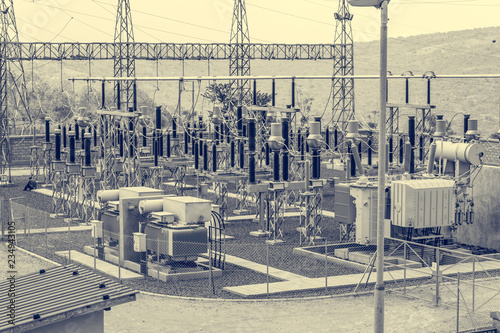 High voltage transformer modern substation electrical switchyard. photo