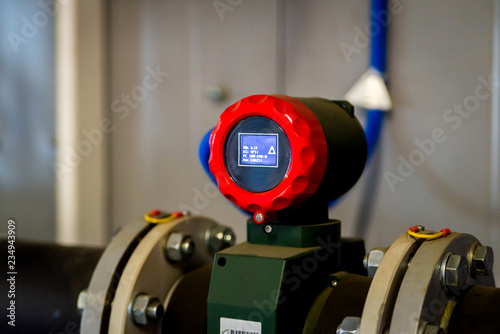 Obraz na płótnie Flow transmitter or Flow transducer equipment function and sent PLC logic to processor in oil and gas production process,Electronic device in oil and gas industry and equipment under maintenance mode w salonie