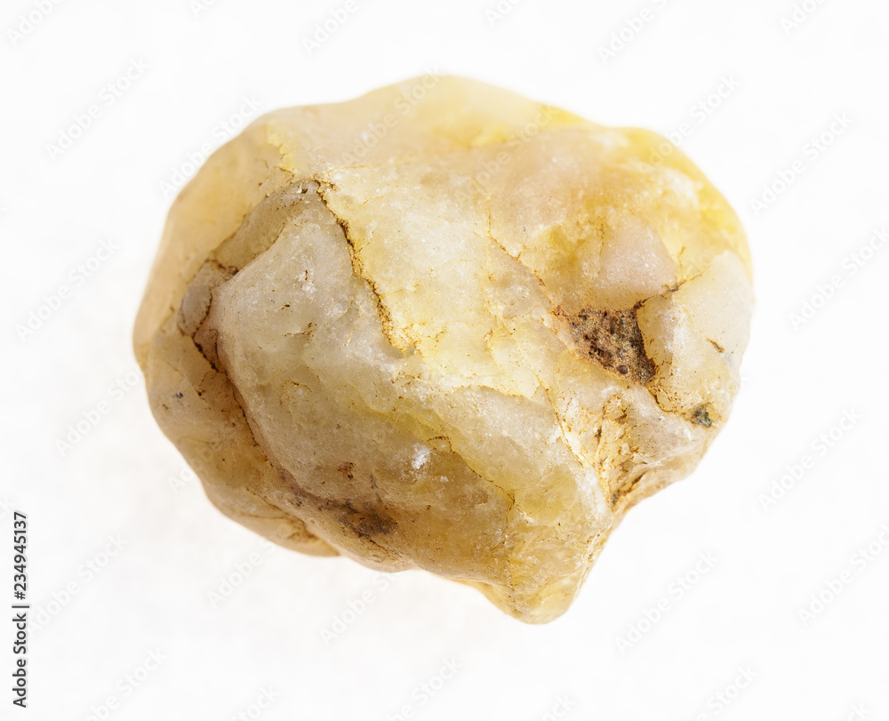 pebble from yellow marble stone on white pebble from yellow marble stone on white
