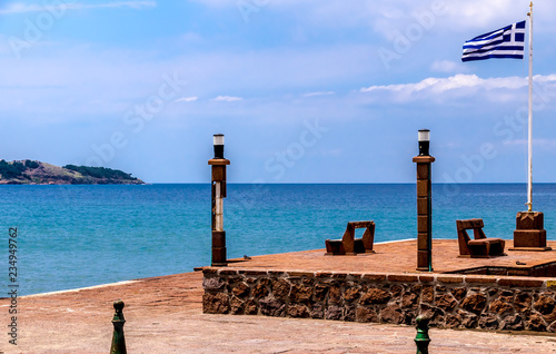 PETRA, LESBOS, GREECE - A beautiful place to relax on the coast, in the town of Petra on Lesvos, overlooking the Aegean Sea on a spring day. photo