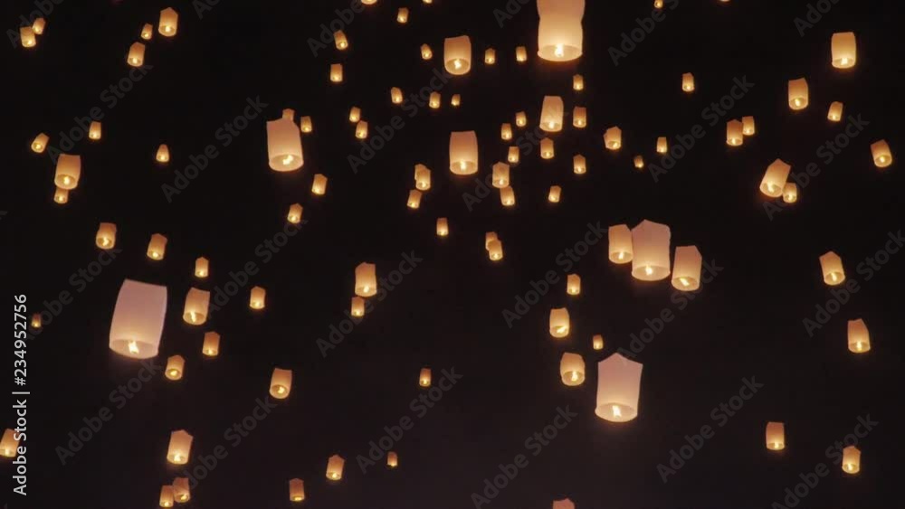 Tourist floating sky lanterns in Loy Krathong festival , Chiang Mai ,Thailand.