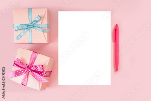 Decorated boxes and blank white sheet of paper.