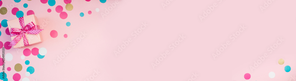 Decorated boxes and confetti on the pink background. Decorated boxes and confetti on the pink background.