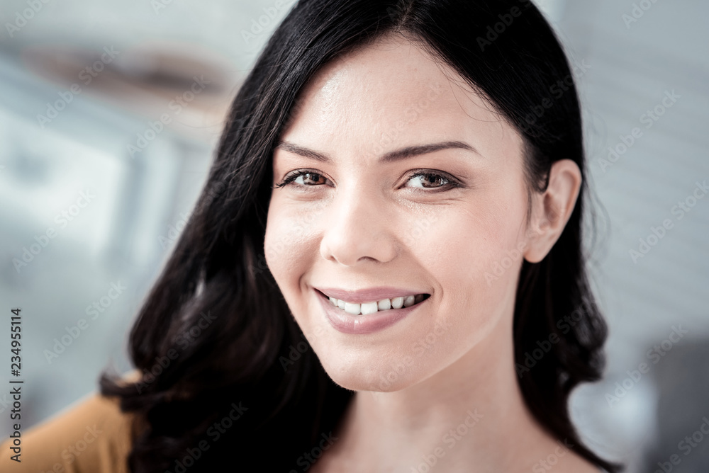Portrait of cheerful woman that watching you Portrait of cheerful woman that watching you