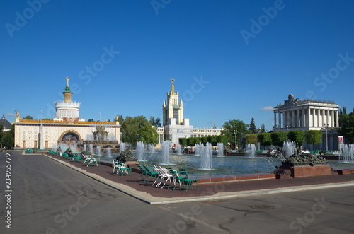 Moscow, Russia - August 14, 2018: Fountain "Stone flower" on the background of pavilions "Ukraine", "Grain" and "Optics" at VDNH